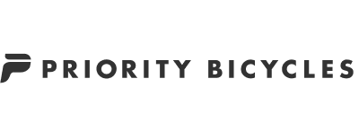 The image displays the logo for Medium in bold, black, geometric letters on a transparent background, featured in the Priority Bicycles case study.